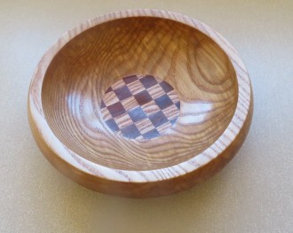 This bowl with checker board bottom won a turning of the month for Chris Withall